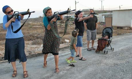 http://www.israeli-occupation.org/images/main-image/settler-women-gun-practice.jpg