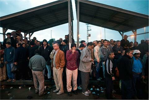 Palestinian workers waiting at Eyal checkpoint - Nov 2009