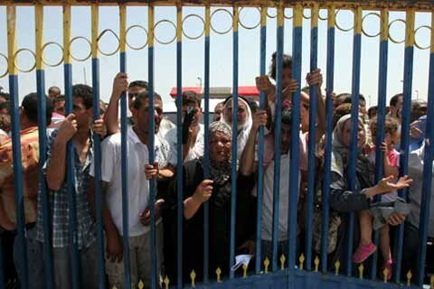 The Rafah Crossing - Palestinians waiting to cross into Egypt