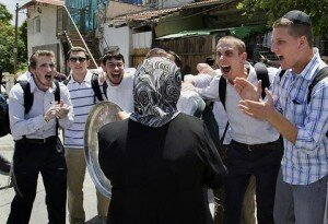 Zionism at work: Orthodox American Jews staunting a Palestinian woman whose Sheikh-Jarrah house has been taken over and occupied by Jewish settlers